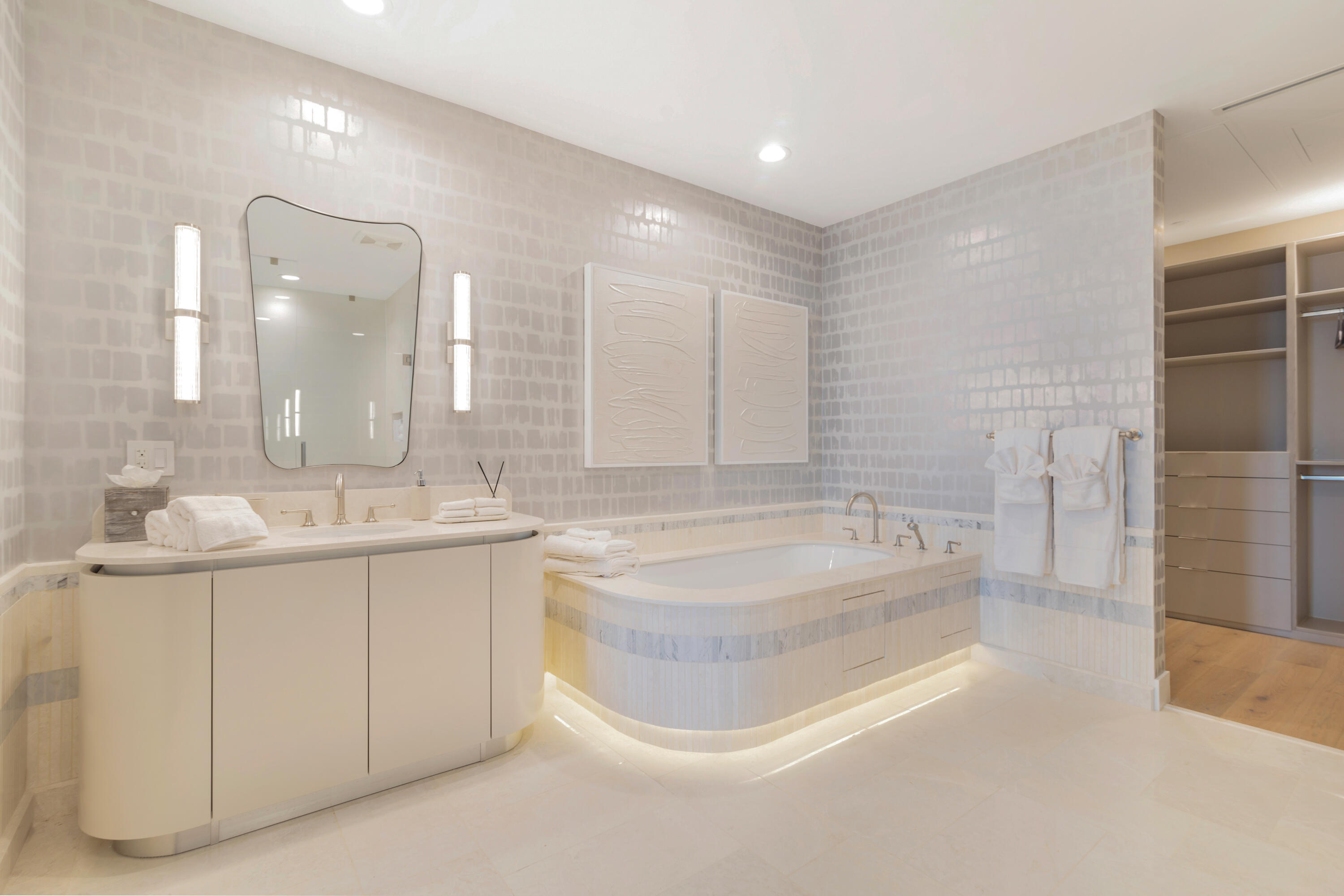 1333 South Flagler Drive, Unit 1202 West Palm Beach, FL 33401 - Photo 7 of 42 a bathroom with a tub sink and mirror