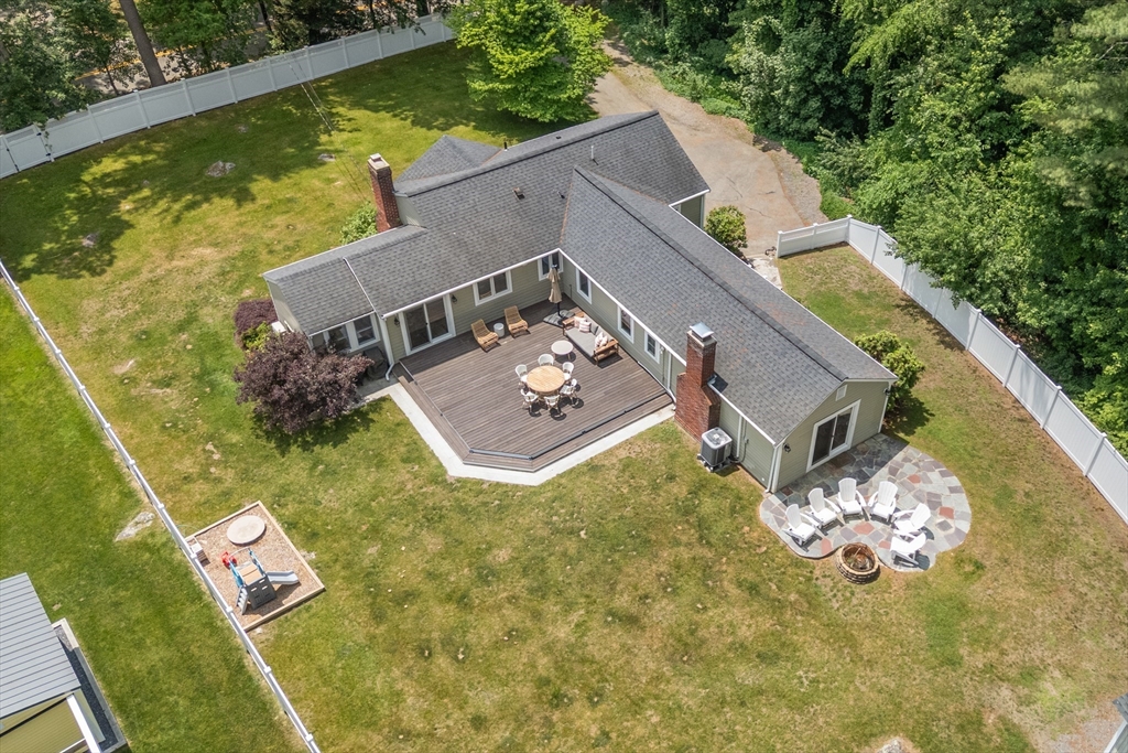 57 Marlboro Road Sudbury, MA 01776 - Photo 2 of 40 an aerial view of house with yard swimming pool and outdoor seating
