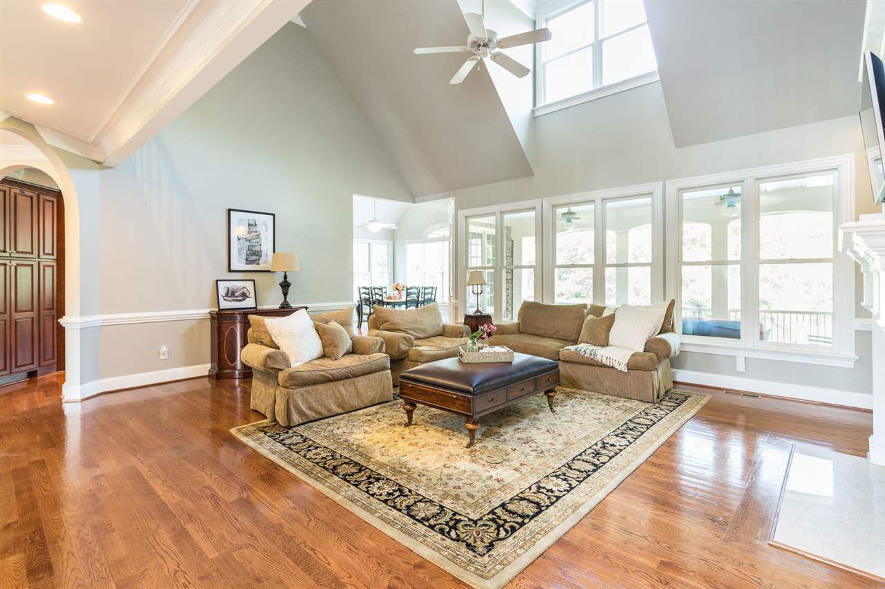 12404 Bayleaf Church Road Raleigh, NC 27614 - Photo 8 of 25 Vaulted ceiling and lots of natural light from the triple windows that overlook the screened in porch and lush backyard. Den/Family/Great Room