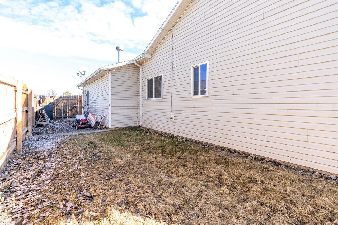1458 Powell Street Fruita, CO 81521 - Photo 23 of 27 a view of a backyard