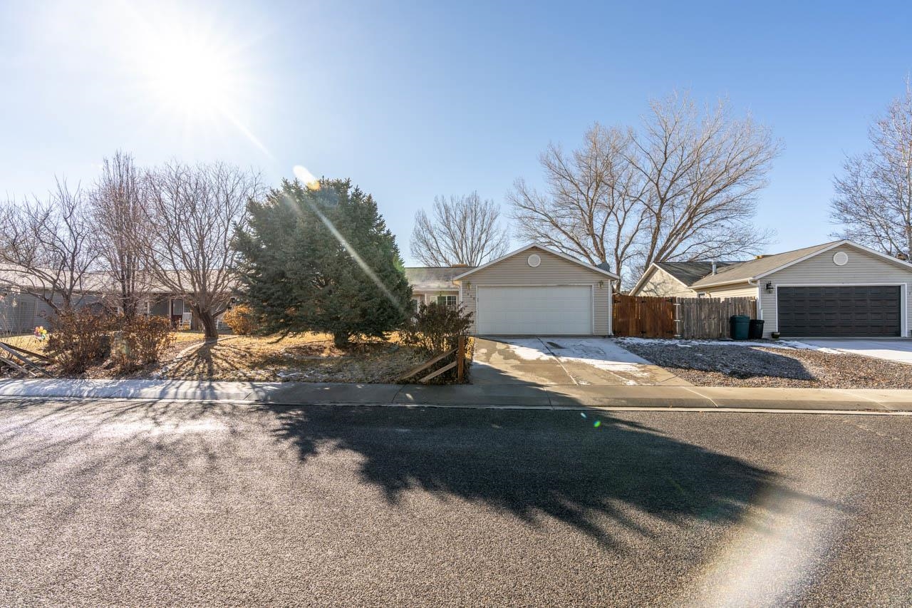 1458 Powell Street Fruita, CO 81521 - Photo 27 of 27 a view of street with house on side