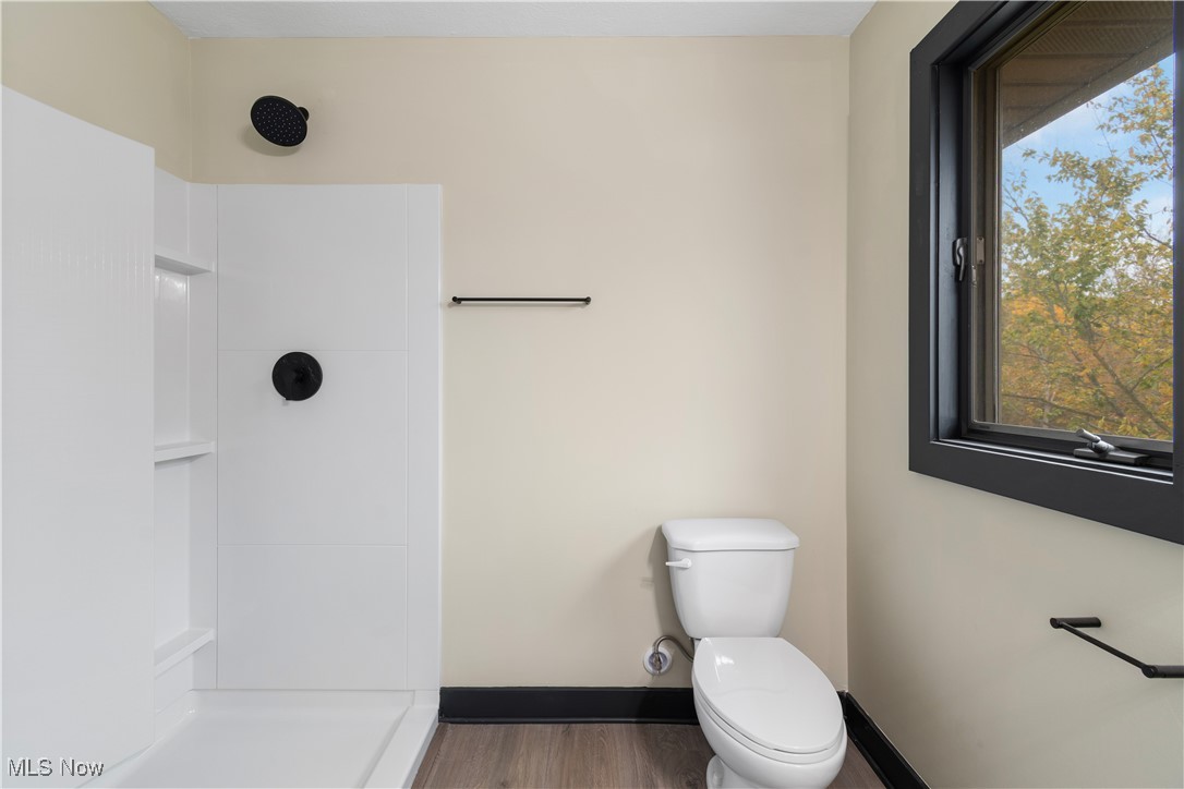 2201 Ridgewood Road Medina, OH 44256 - Photo 29 of 50 Full bath featuring a shower and wood finished floors