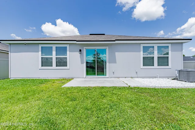 a view of a backyard with a garden