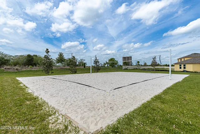 a view of outdoor space with swimming pool and seating