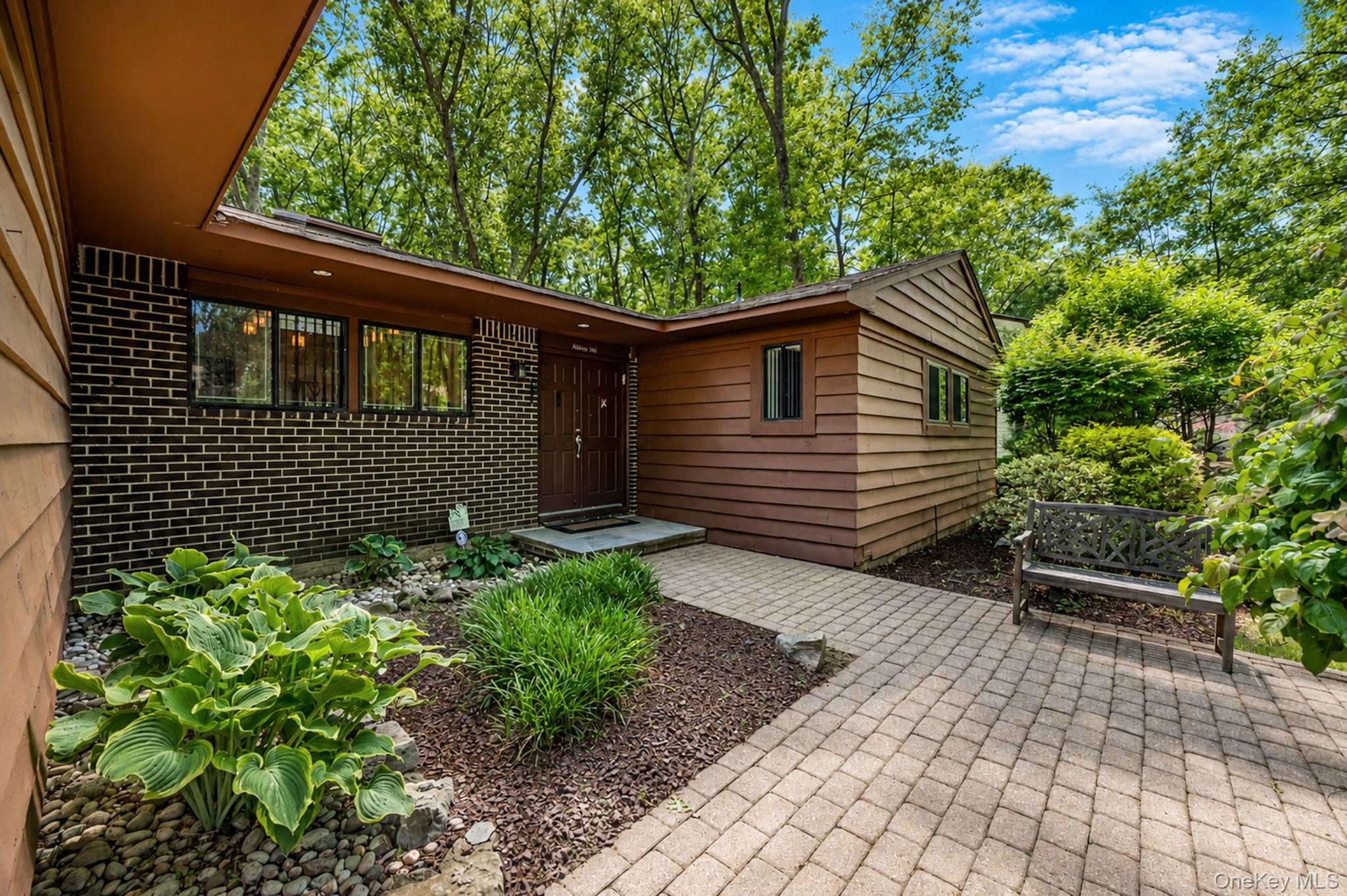 96 Fulton Boulevard Commack, NY 11725 - Photo 3 of 41 a backyard of a house with lots of green space