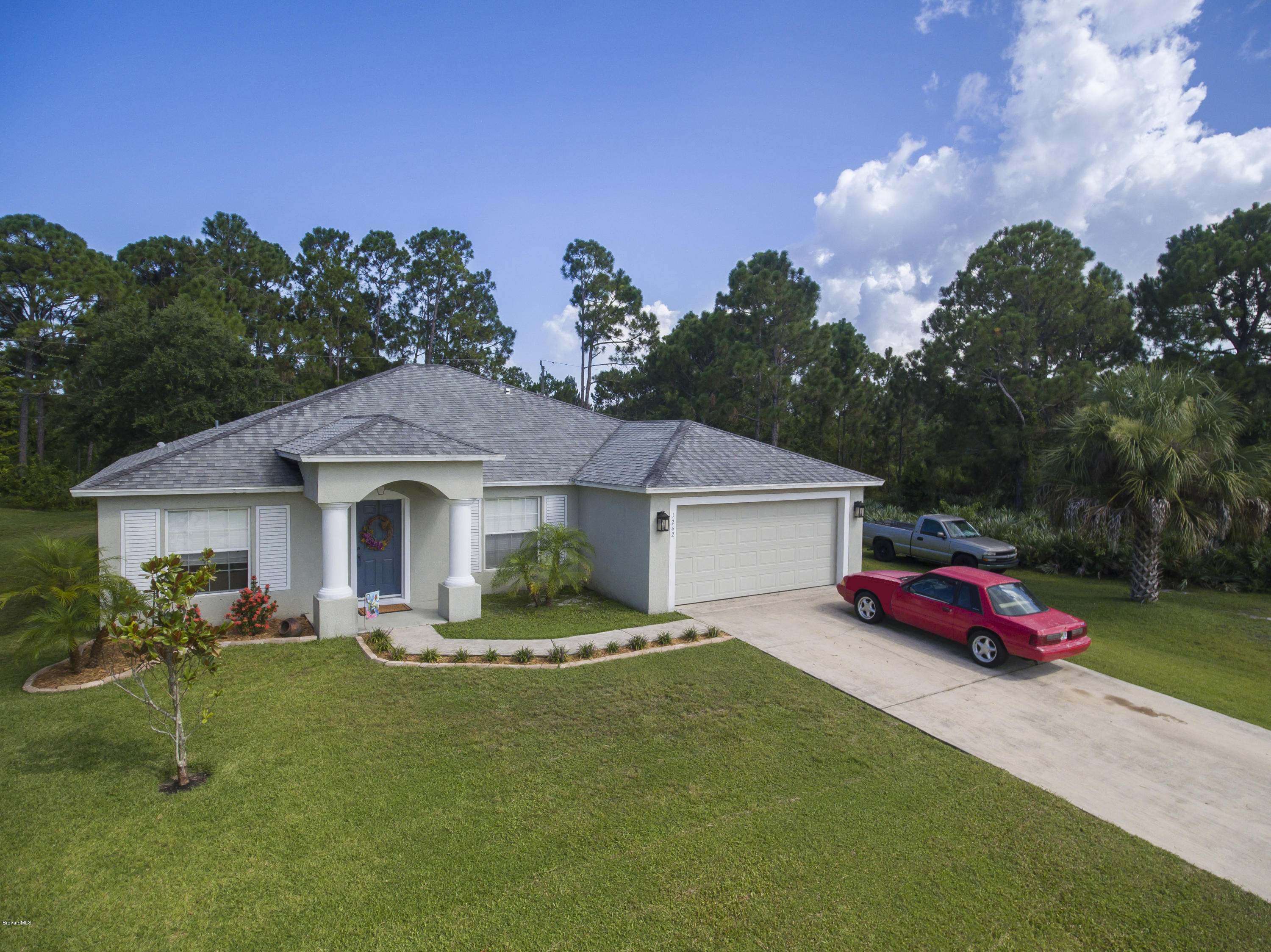 1242 Ragen Road Southeast Palm Bay, FL 32909 - Photo 1 of 20 1242 Ragen Aerial