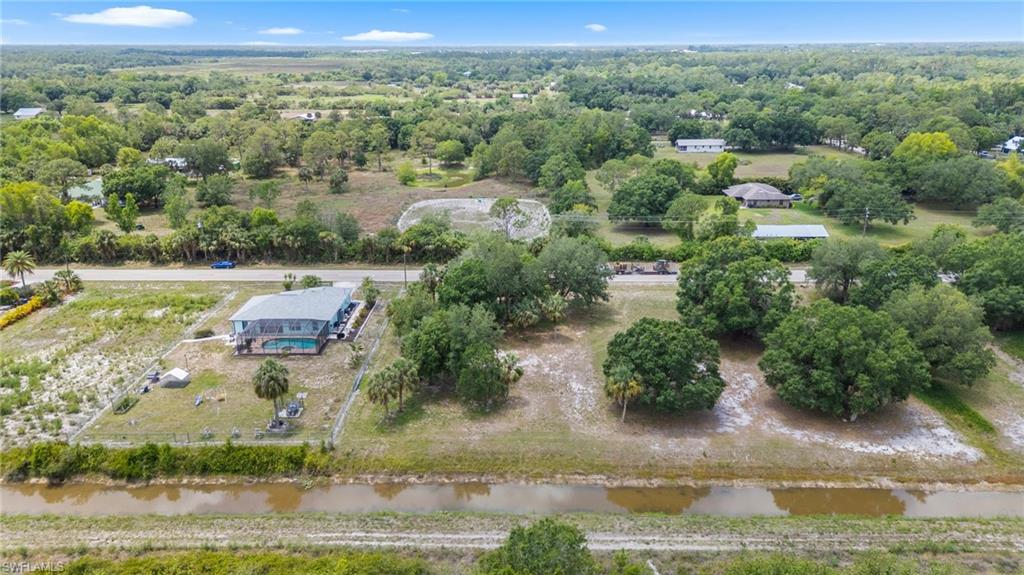 15561 Cemetery Road Fort Myers, FL 33905 - Photo 1 of 5 Drone / aerial view of a nearby body of water