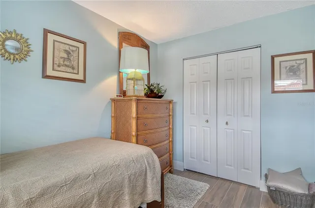 a view of a swimming pool with a lounge chair