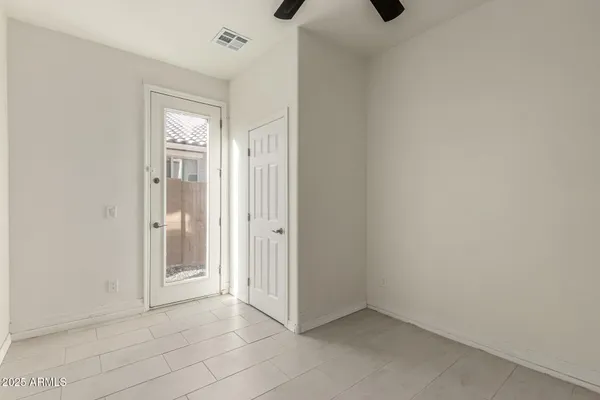an empty room with windows