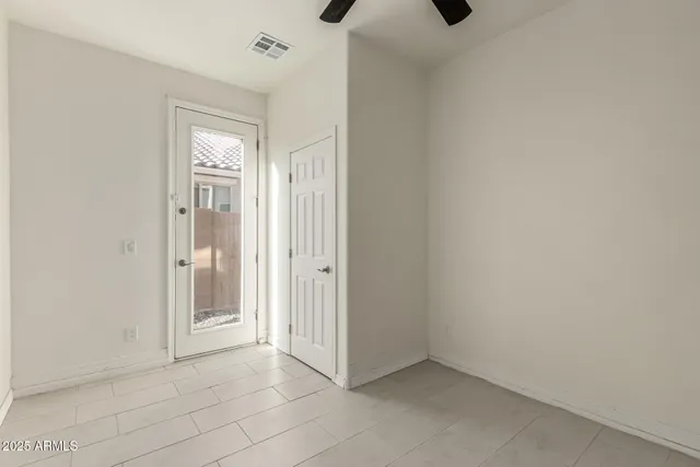 an empty room with windows