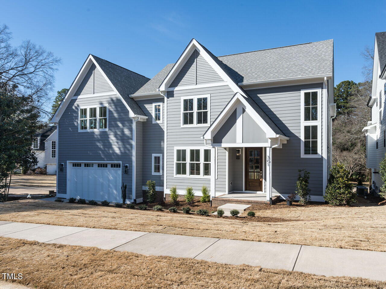 301 Shepherd Street Raleigh, NC 27607 - Photo 1 of 37 a front view of a house with a yard