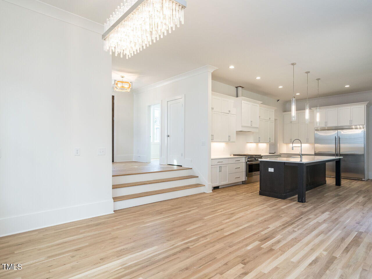 301 Shepherd Street Raleigh, NC 27607 - Photo 14 of 37 a large kitchen with a lot of counter space and wooden floor