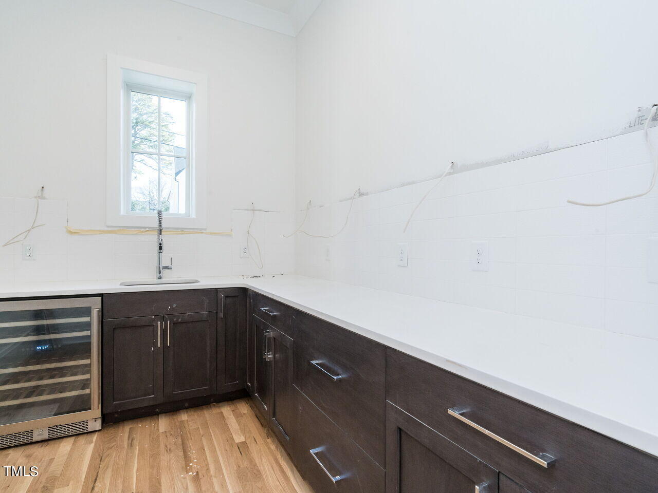 301 Shepherd Street Raleigh, NC 27607 - Photo 20 of 37 a kitchen with a sink and cabinets