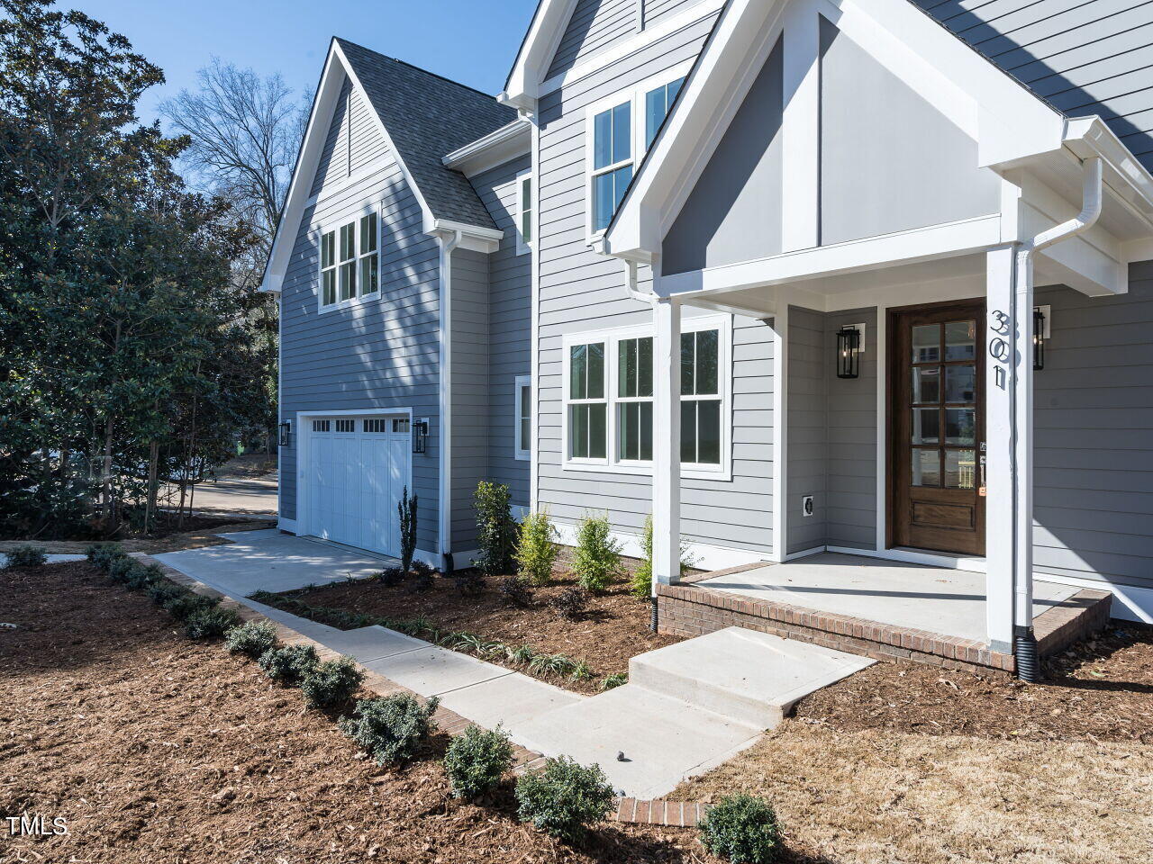301 Shepherd Street Raleigh, NC 27607 - Photo 2 of 37 a front view of a house with yard