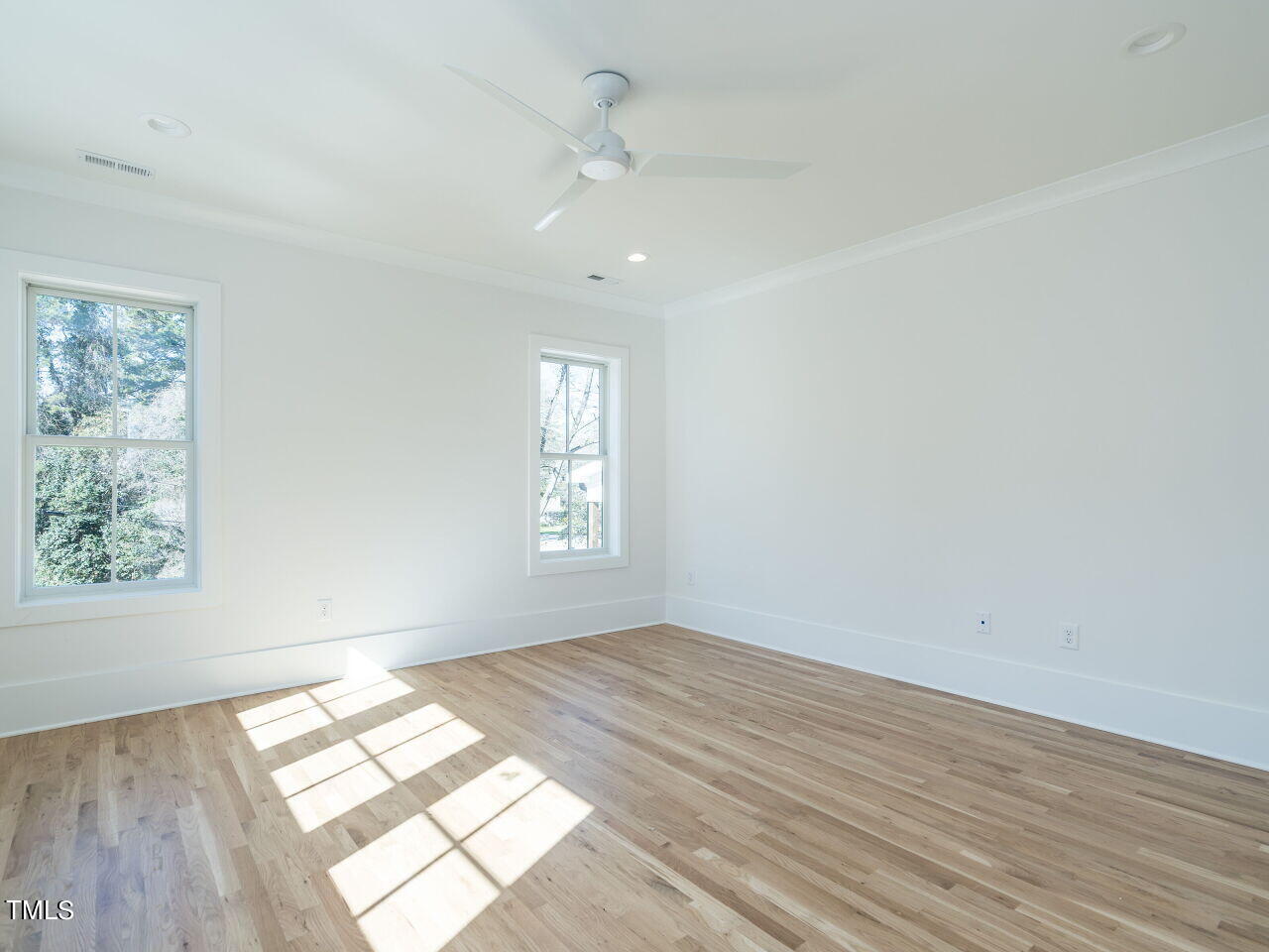 301 Shepherd Street Raleigh, NC 27607 - Photo 23 of 37 wooden floor in an empty room with a window