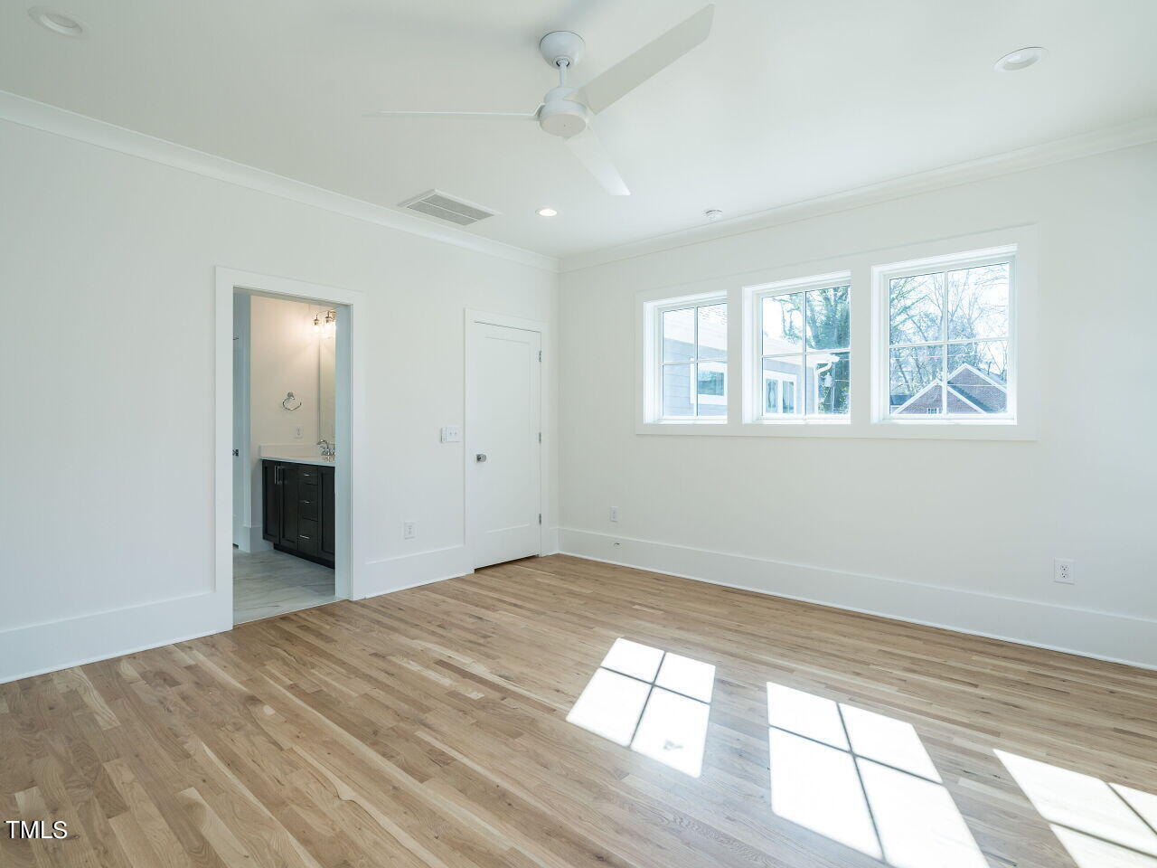 301 Shepherd Street Raleigh, NC 27607 - Photo 25 of 37 a view of empty room with wooden floor and fan