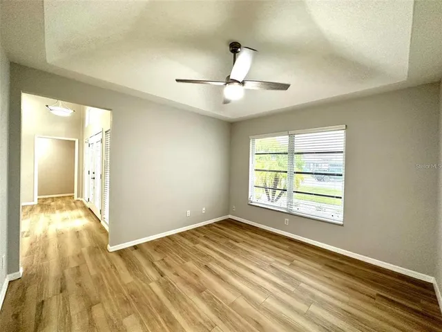 a view of an empty room and window