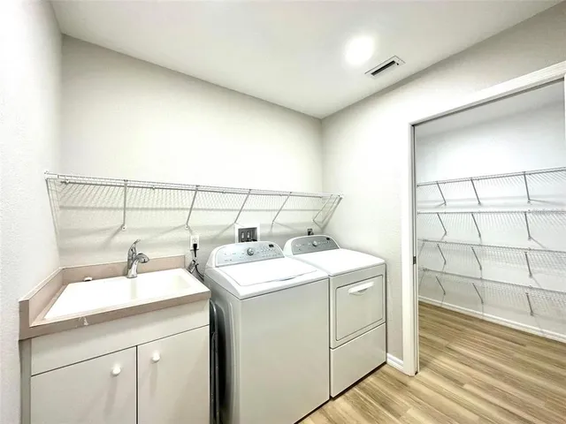 a utility room with dryer and washer