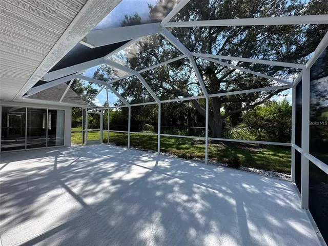 a view of a room with wooden walls