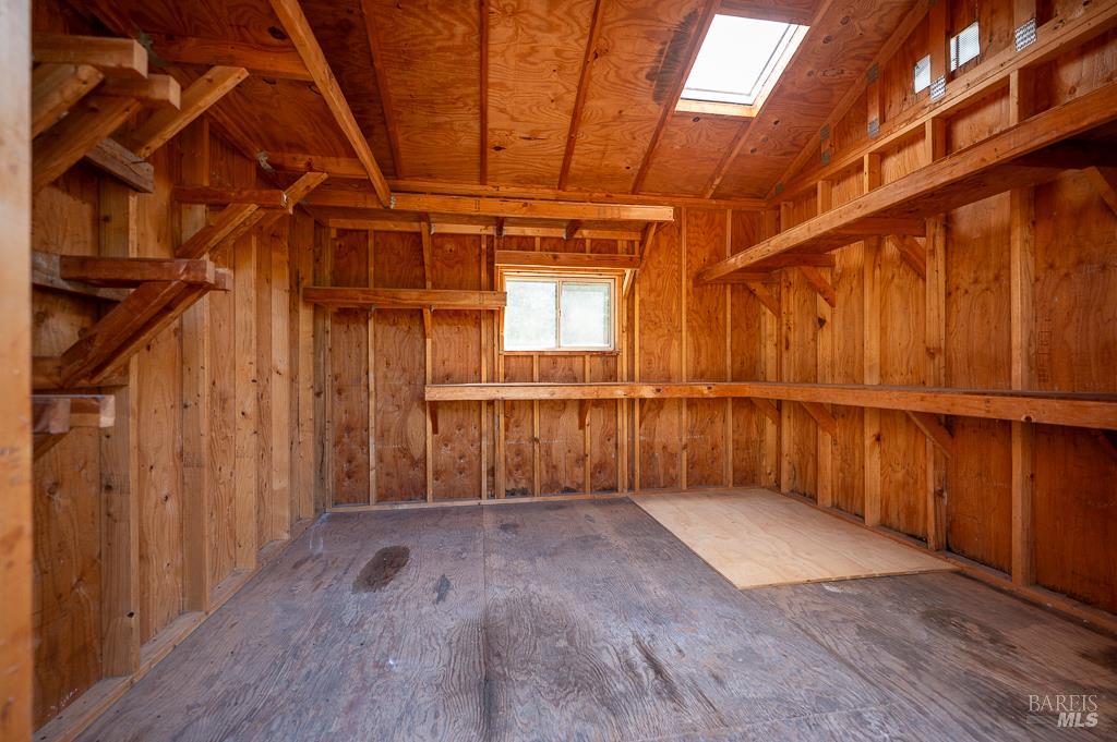 790 Ferguson Road Sebastopol, CA 95472 - Photo 10 of 15 an empty room with wooden floor and windows