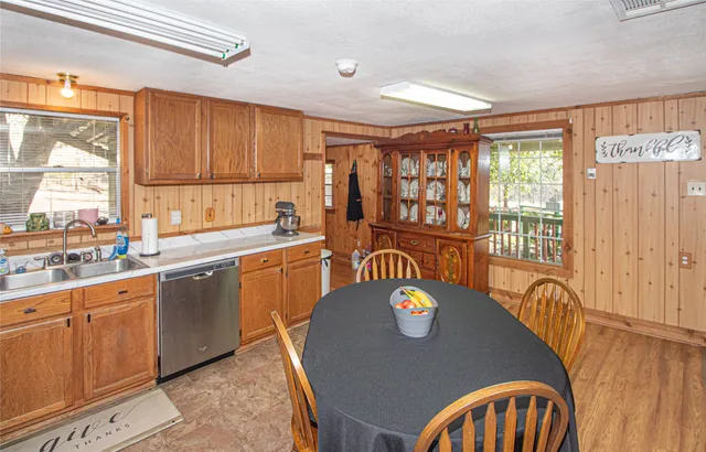 a view of a kitchen area with furniture and window