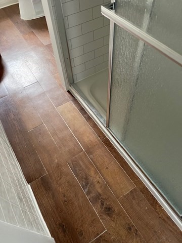 23 Plumer Street Everett, MA 02149 - Photo 12 of 29 a bathroom with a shower