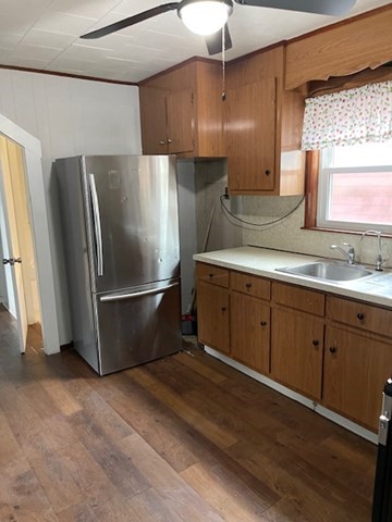 23 Plumer Street Everett, MA 02149 - Photo 13 of 29 a kitchen with stainless steel appliances a refrigerator and a sink