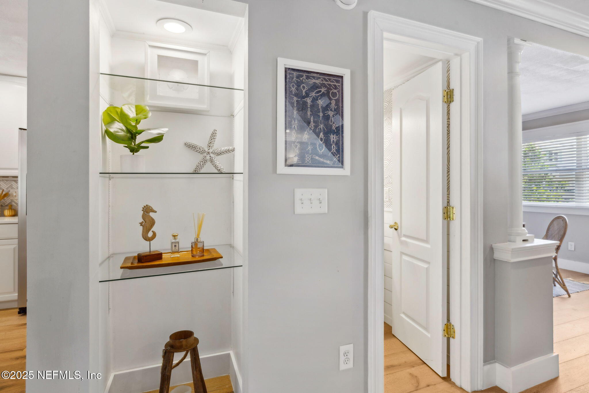 2233 Seminole Road, Unit 10 Atlantic Beach, FL 32233 - Photo 17 of 63 a view of a hallway with a dining room