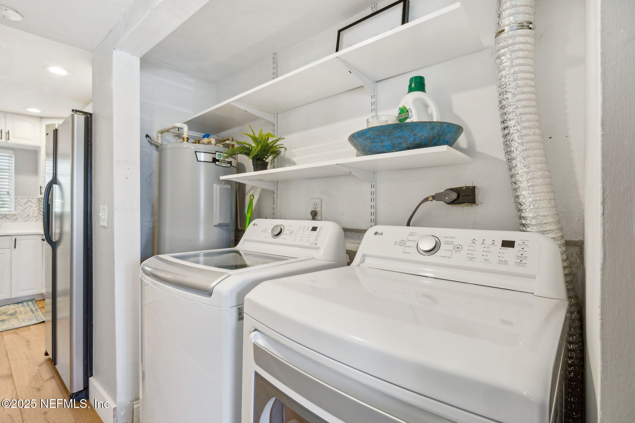 2233 Seminole Road, Unit 10 Atlantic Beach, FL 32233 - Photo 22 of 63 a utility room with dryer and washer