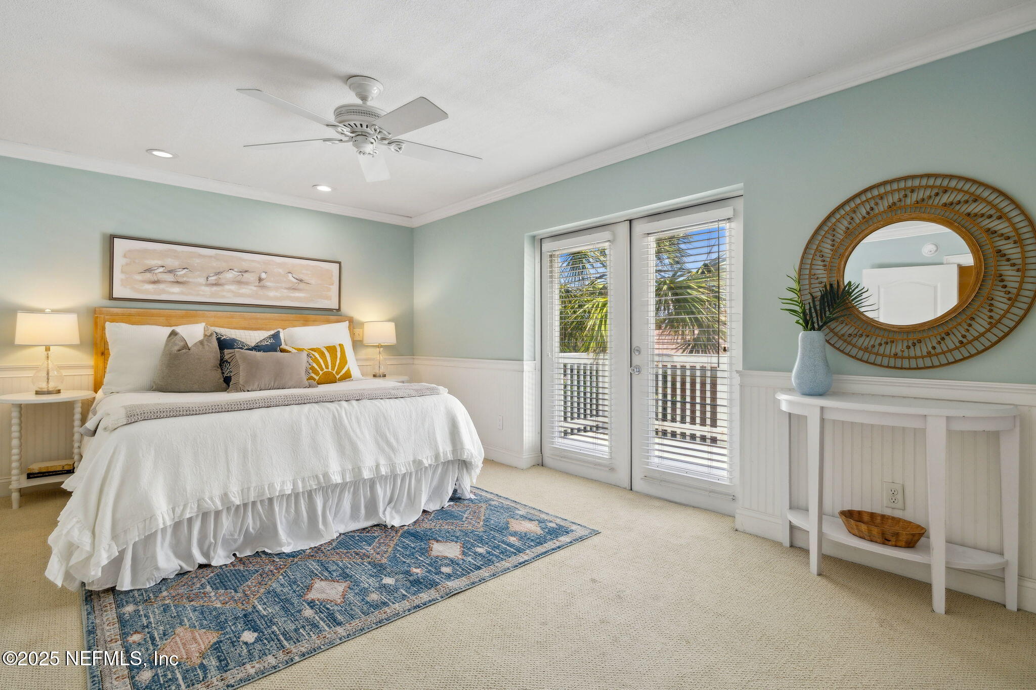 2233 Seminole Road, Unit 10 Atlantic Beach, FL 32233 - Photo 24 of 63 a bedroom with a bed and a lamp