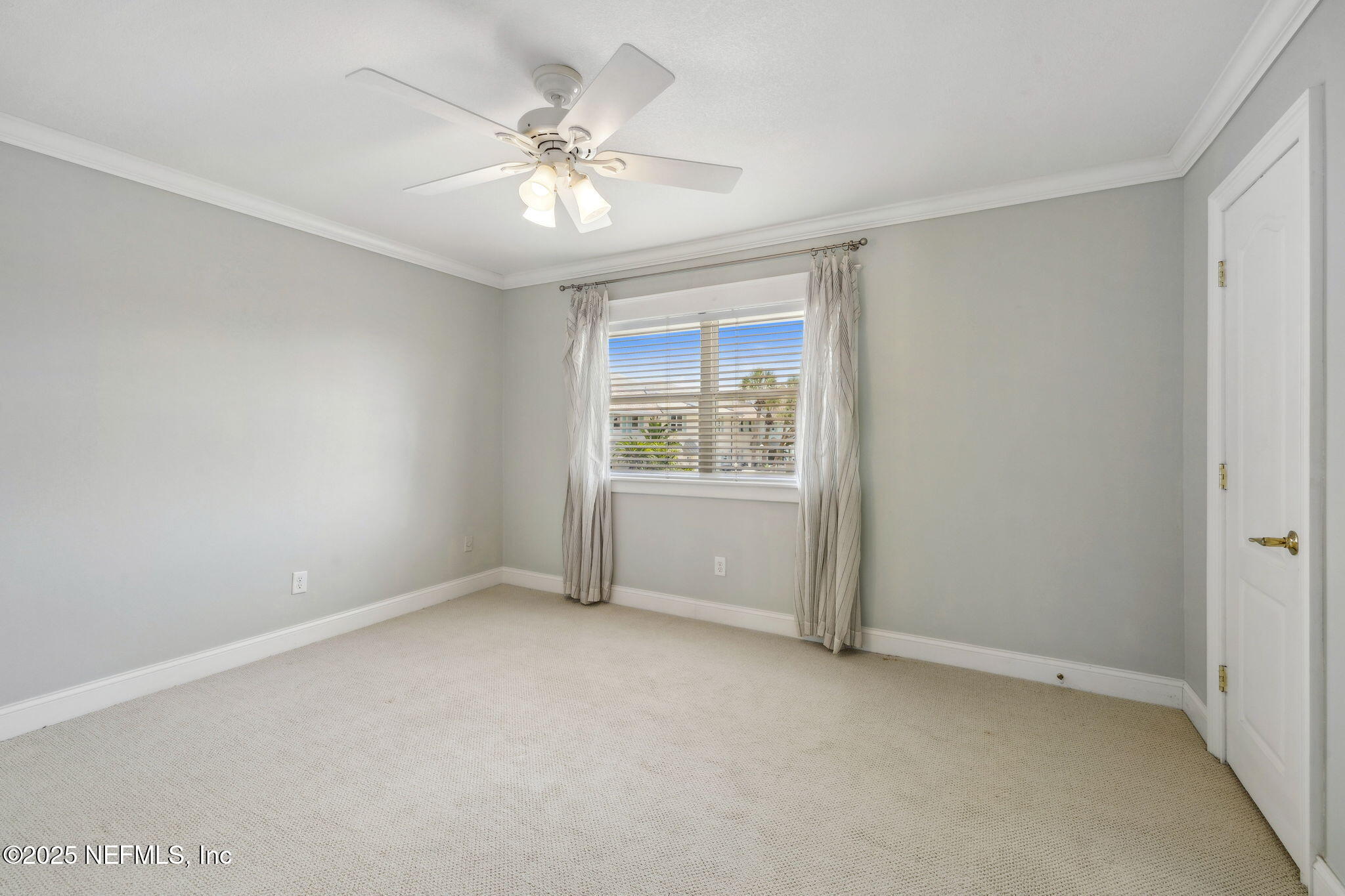 2233 Seminole Road, Unit 10 Atlantic Beach, FL 32233 - Photo 34 of 63 a view of an empty room with a window