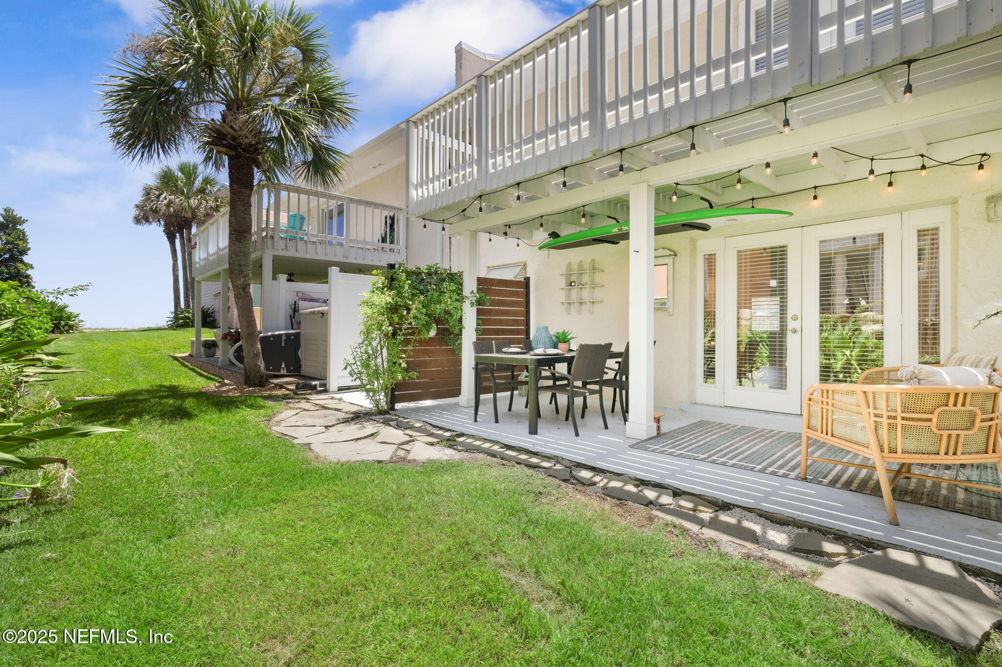 2233 Seminole Road, Unit 10 Atlantic Beach, FL 32233 - Photo 40 of 63 a view of a backyard with a patio
