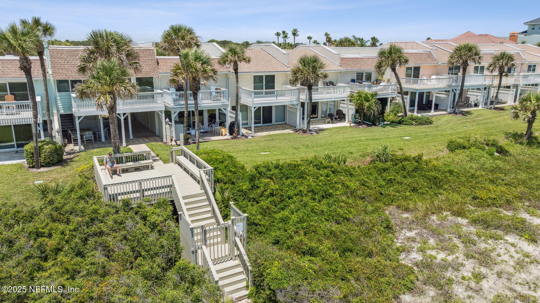 2233 Seminole Road, Unit 10 Atlantic Beach, FL 32233 - Photo 45 of 63 a aerial view of a house with a yard