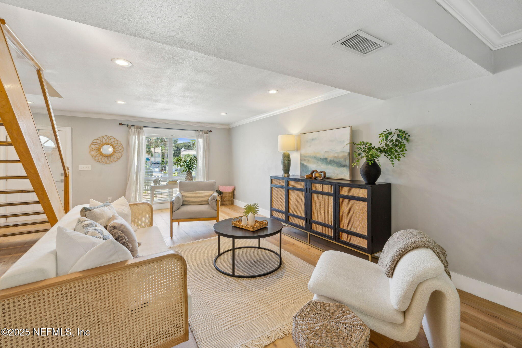 2233 Seminole Road, Unit 10 Atlantic Beach, FL 32233 - Photo 7 of 63 a living room with furniture and a table