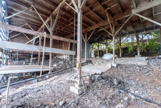 a view of a room with wooden walls