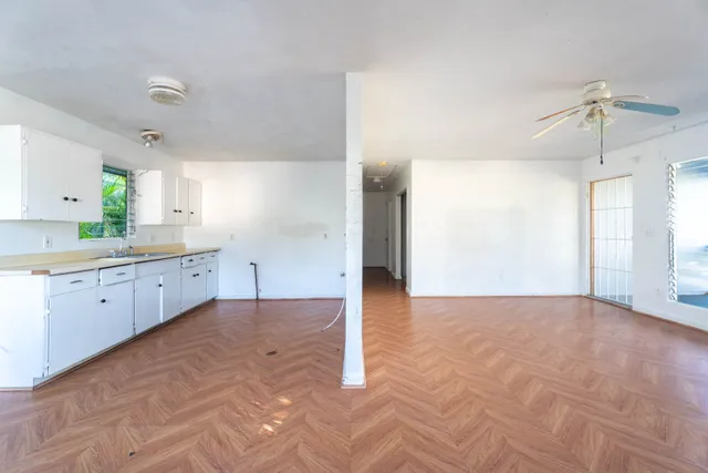 a view of a kitchen with a sink