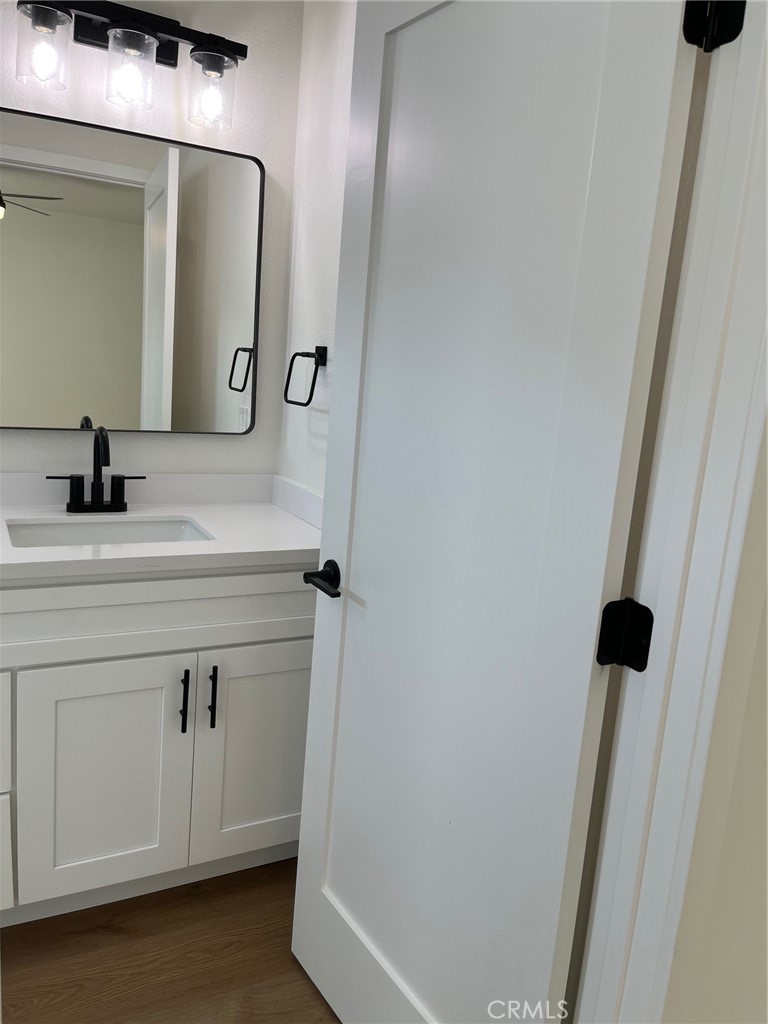 504 East Stuart Avenue, Unit 2 Redlands, CA 92374 - Photo 14 of 22 a bathroom with a sink and a mirror