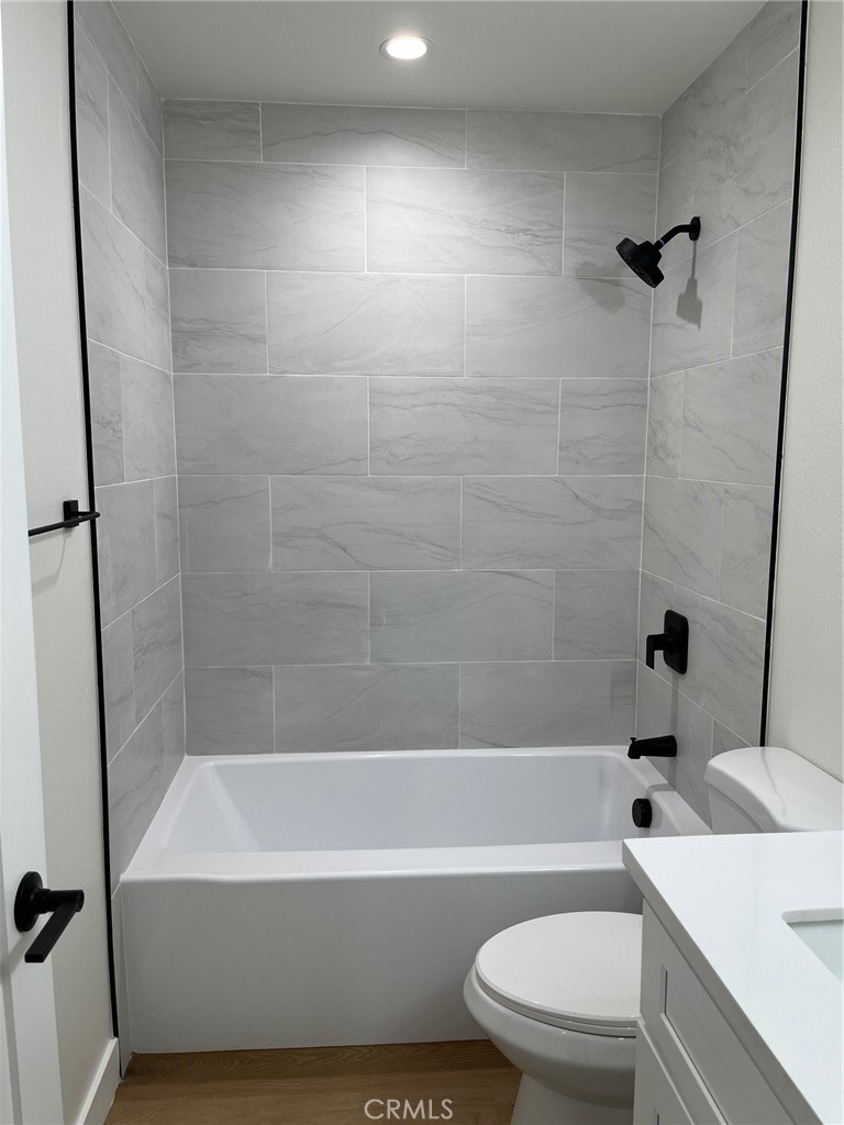 504 East Stuart Avenue, Unit 2 Redlands, CA 92374 - Photo 7 of 22 a bathroom with a bathtub and a toilet