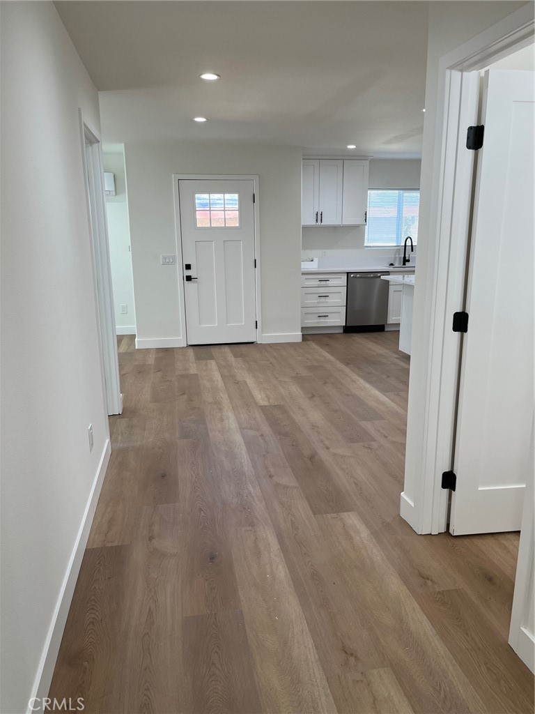 504 East Stuart Avenue, Unit 2 Redlands, CA 92374 - Photo 8 of 22 a view of a kitchen with wooden floor