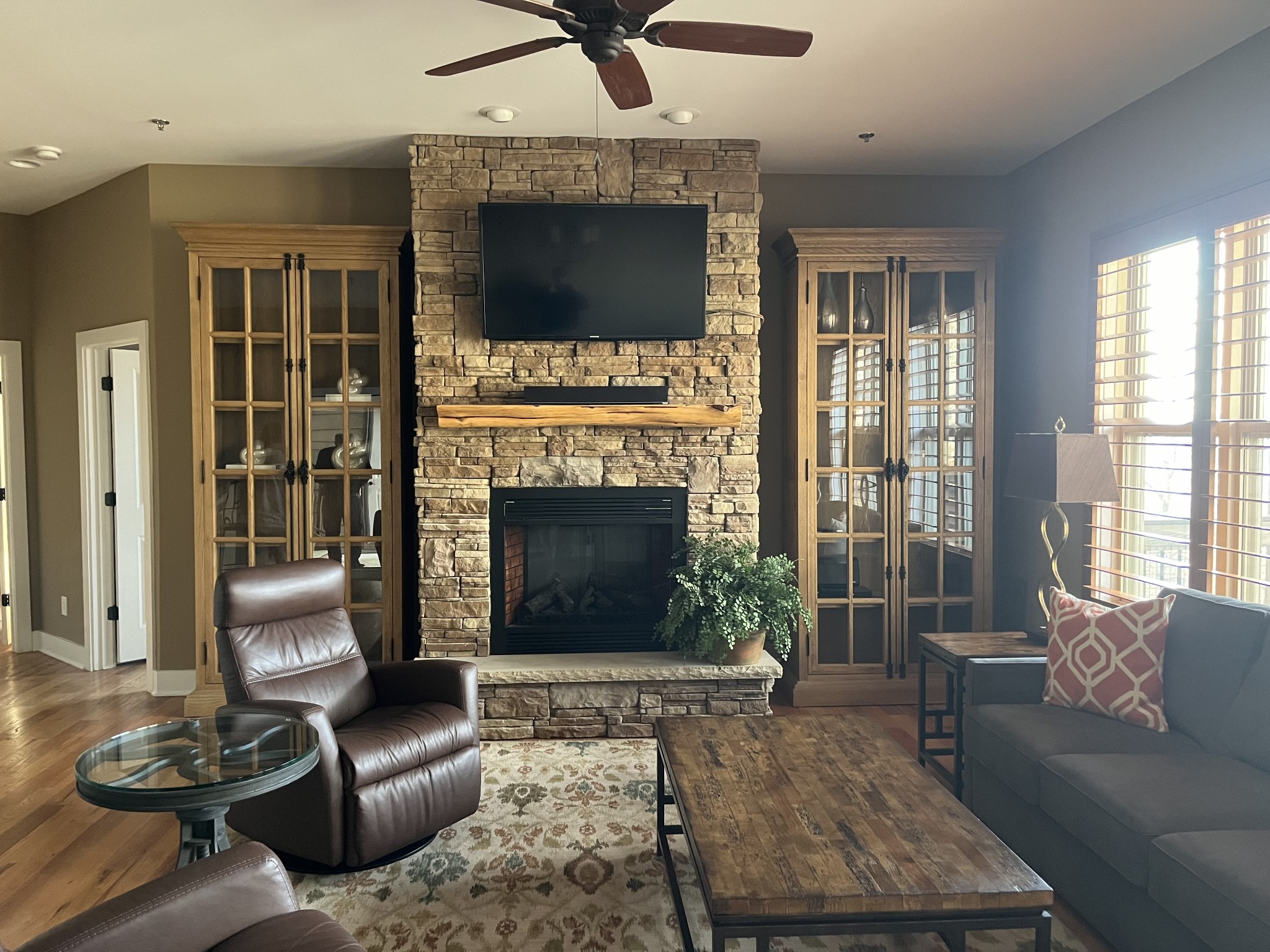316 Floating Mill Road Silver Point, TN 38582 - Photo 3 of 12 a living room with furniture a flat screen tv and a fireplace