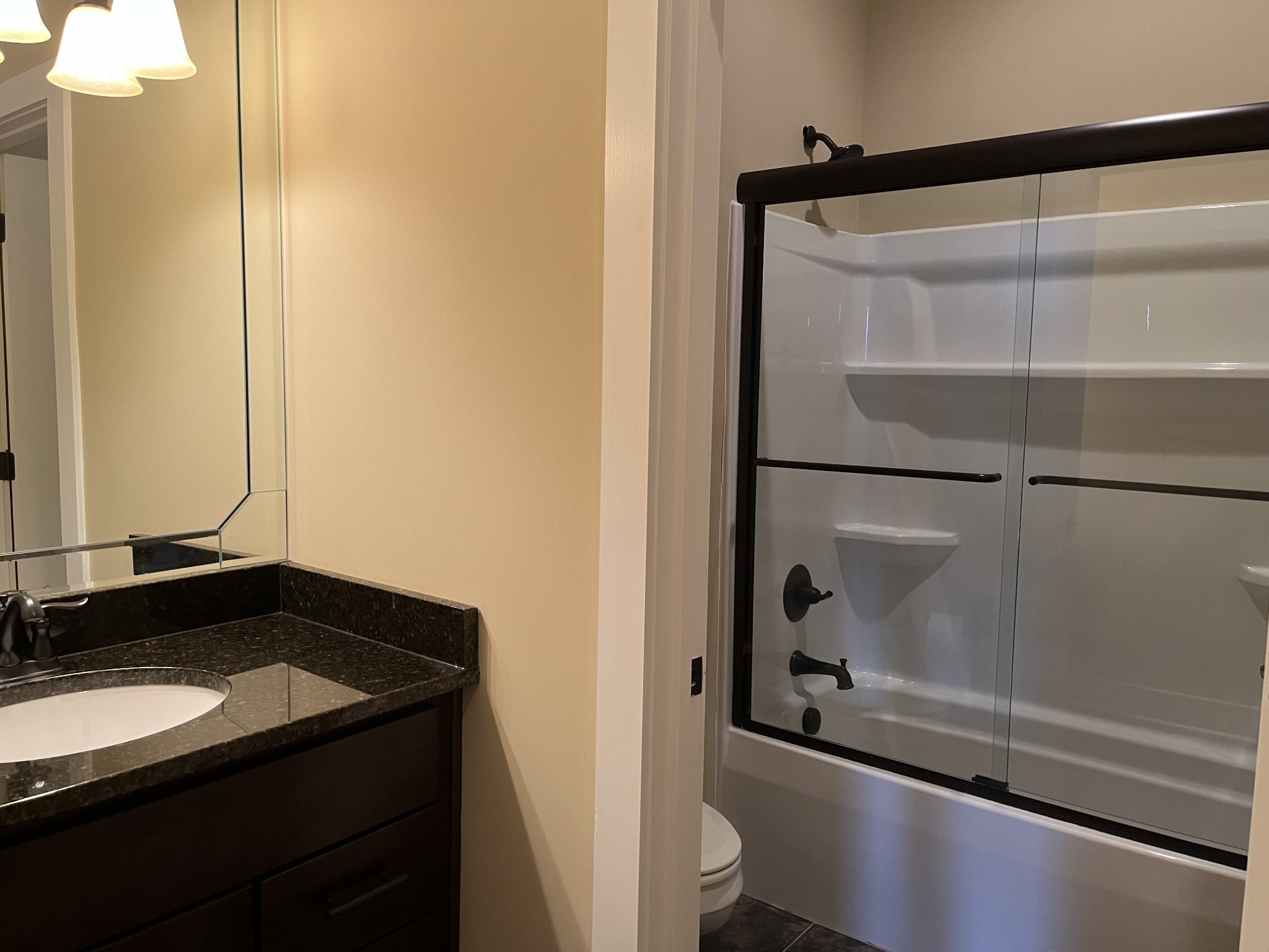 316 Floating Mill Road Silver Point, TN 38582 - Photo 10 of 12 a bathroom with a granite countertop sink and a mirror