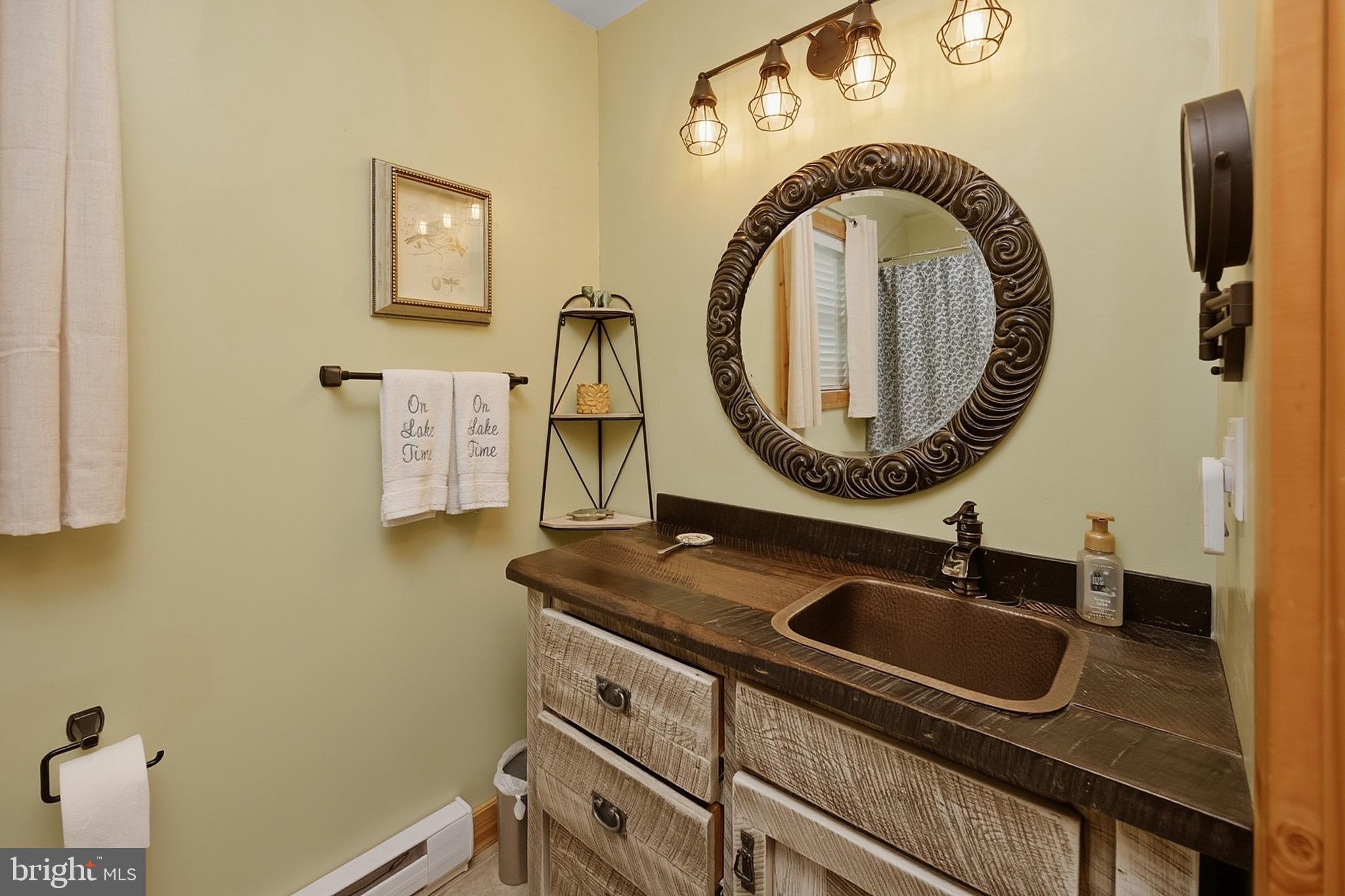 96 Whispering Way Swanton, MD 21561 - Photo 32 of 52 Main level full bath adjacent to bedroom