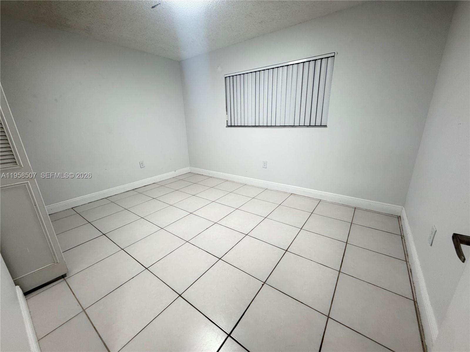 8760 Southwest 133rd Avenue Road, Unit 217 Miami, FL 33183 - Photo 6 of 10 a view of an empty room