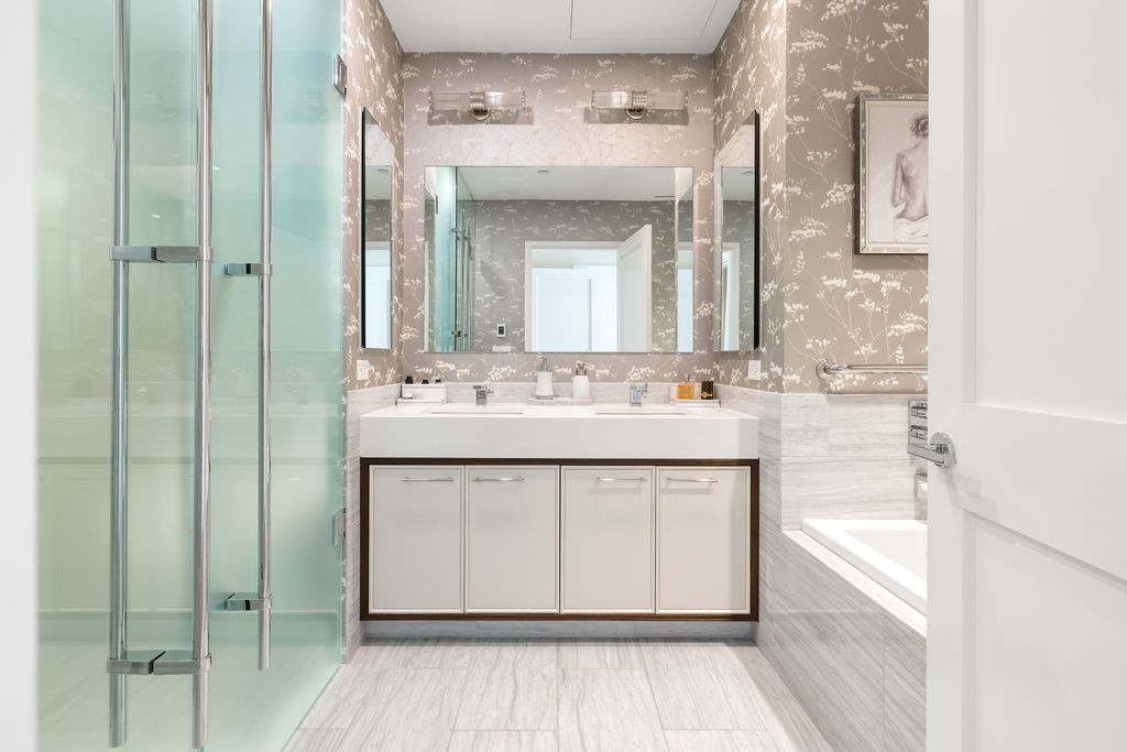 1 Dalton Street, Unit 3205 Boston, MA 02115 - Photo 19 of 42 a bathroom with a sink double vanity and a mirror