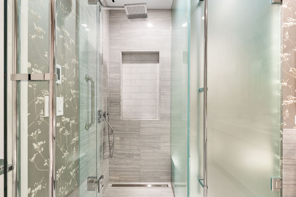 1 Dalton Street, Unit 3205 Boston, MA 02115 - Photo 20 of 42 a bathroom with a glass shower door