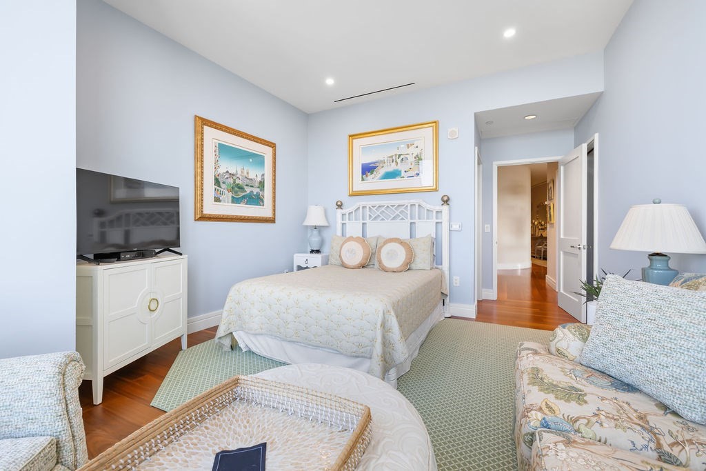 1 Dalton Street, Unit 3205 Boston, MA 02115 - Photo 23 of 42 a bedroom with 2 bed and a flat screen tv