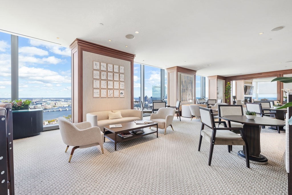 1 Dalton Street, Unit 3205 Boston, MA 02115 - Photo 28 of 42 a living room with furniture and a large window
