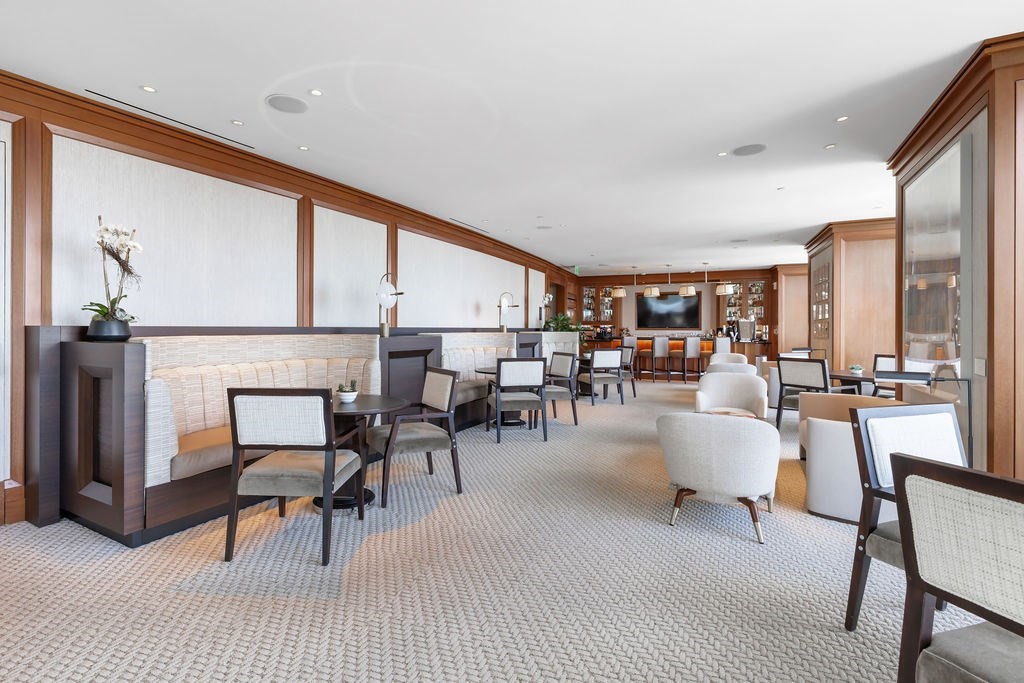 1 Dalton Street, Unit 3205 Boston, MA 02115 - Photo 29 of 42 a living room with furniture a table and chairs