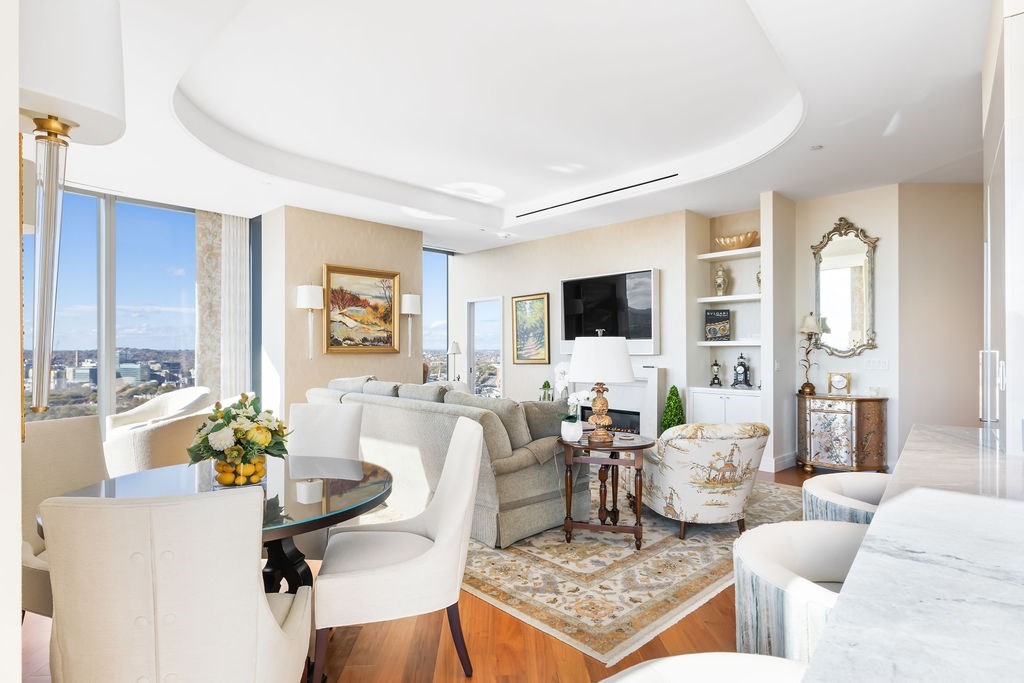 1 Dalton Street, Unit 3205 Boston, MA 02115 - Photo 3 of 42 a living room with furniture and a flat screen tv