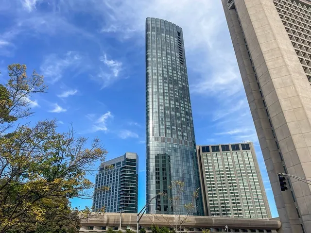 a view of a city with tall buildings